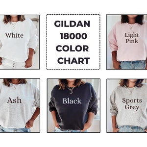 May include: Colour chart for Gildan 18000 sweatshirts. The chart shows six different colours: white, light pink, ash, black, sports grey.