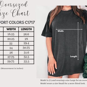 May include: A dark gray oversized t-shirt with a size chart. The chart shows measurements in inches for sizes S to 4XL. The model is wearing a size Large for an oversized fit. The shirt's width ranges from 18.25 to 29.75 inches.