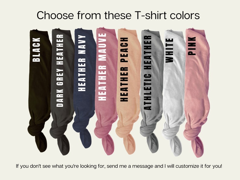 May include: A selection of t-shirt colors, including black, dark grey heather, heather navy, heather mauve, heather peach, athletic heather, white, and pink.