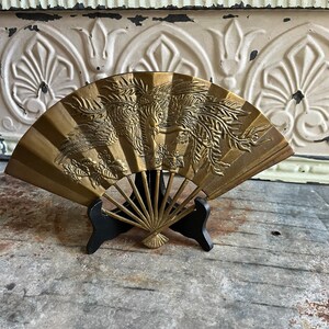 Brass fan by Enesco with flying dragon bird
