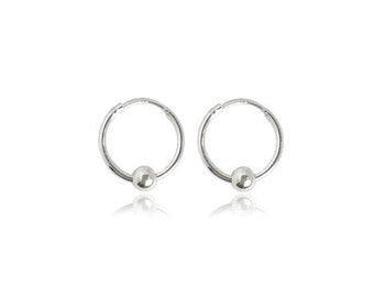 Small silver hoops with a silver bead