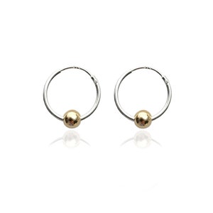 Small silver sleeper hoops with a 9ct solid gold bead