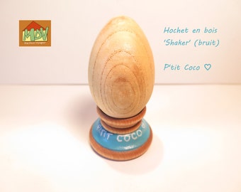 wooden egg shaker rattle with stand and the french term of endearment P'tit Coco