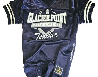 May include: Navy blue mesh jersey with white and black accents. The jersey features the text "Glacier Point Huskies Teacher" in white and silver. The sleeves have white stripes.