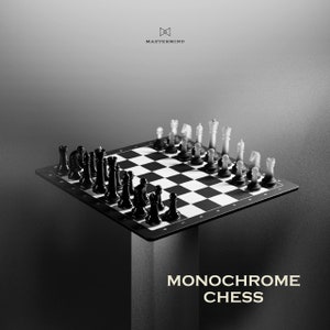 May include: A black and white chess set on a black and white chessboard. The chess pieces are arranged in a starting position. The chessboard is on a black pedestal. The text "MONOCHROME CHESS" is below the chessboard.