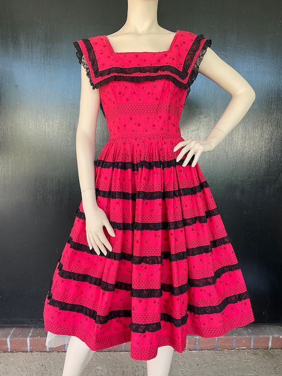 1950s pink and black dress
