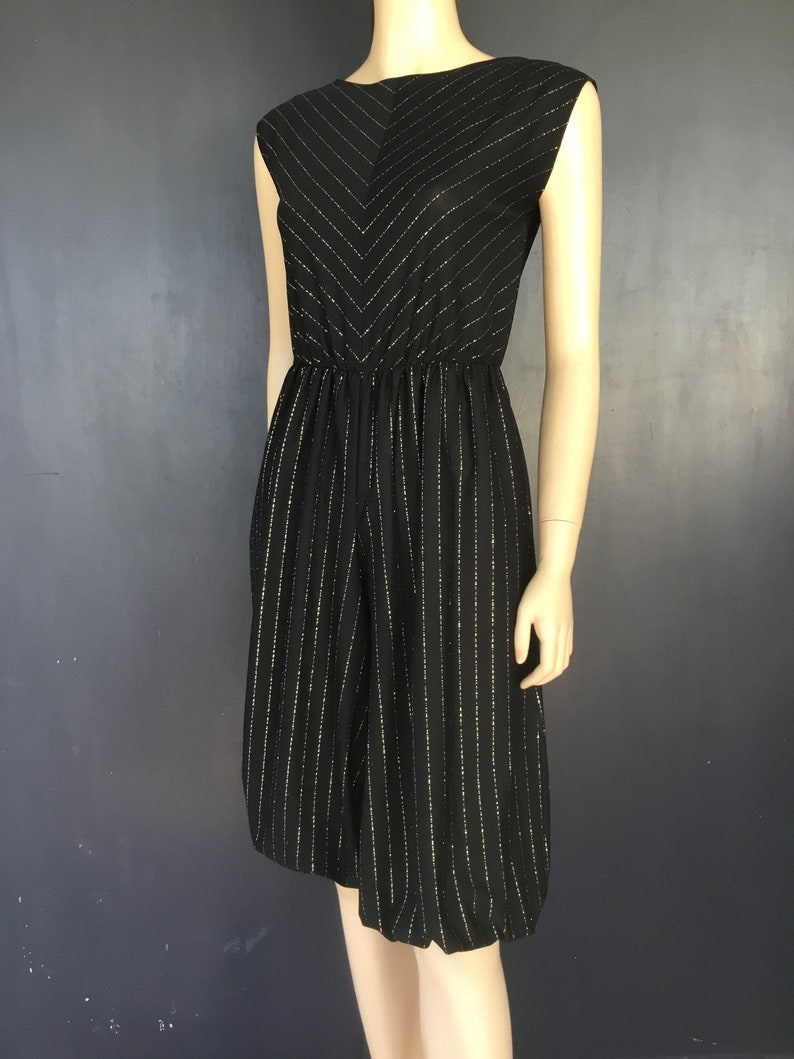 1970s black and gold r.a Landau jumpsuit