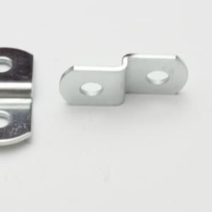 May include: Two silver metal shelf brackets with two holes each. The brackets are designed to be attached to a shelf and a wall.