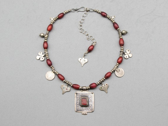Ida Ou Nadif pendant necklace with antique red Venetian Samburu glass beads | Sahrawi amulets | niello red glass | modern ethnic jewelry