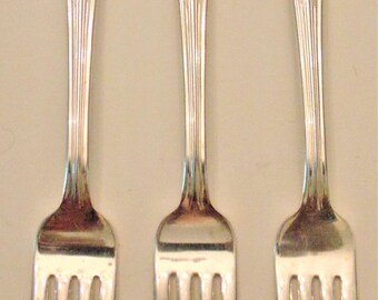 Juego de cubiertos plateados "Lenox" de Wallace Silver + cucharas para servir