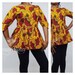 see more listings in the tops/blouse section