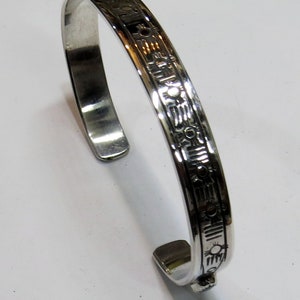 Sweet, Hand stamped, Sterling Silver Cuff Bracelet, with Onyx accents.