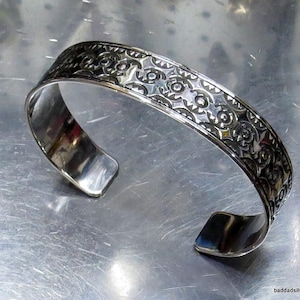 Hand stamped, &quot;Herd of Turtles&quot;,  9/16&quot; wide, sterling silver cuff bracelet.  sz M