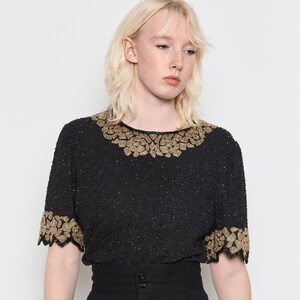 Black and gold evening tops best sale
