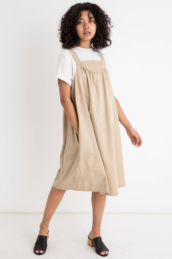 tan jumper dress