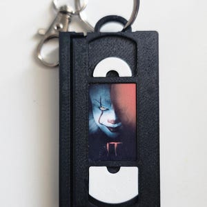 May include: A set of three ceramic nesting bowls in shades of blue, green, and white. The bowls feature a speckled glaze and a simple, modern design. The largest bowl is approximately 6 inches in diameter.