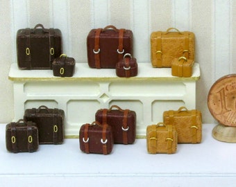 Set of four suitcases, handmade in leather, scale 1/48