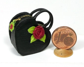 Miniature heart-shaped hand bag