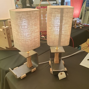 1 pair of art deco / industrial style light fixtures.