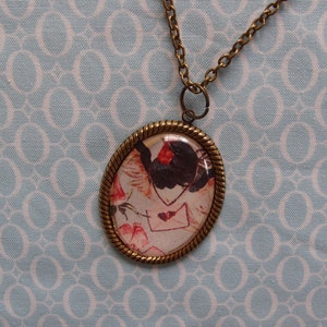 Collar con camafeo y carta de amor de Red Robin