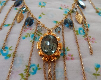 Gold Plated Tassel Necklace with Montana Blue Swarovski Crystal Pendant