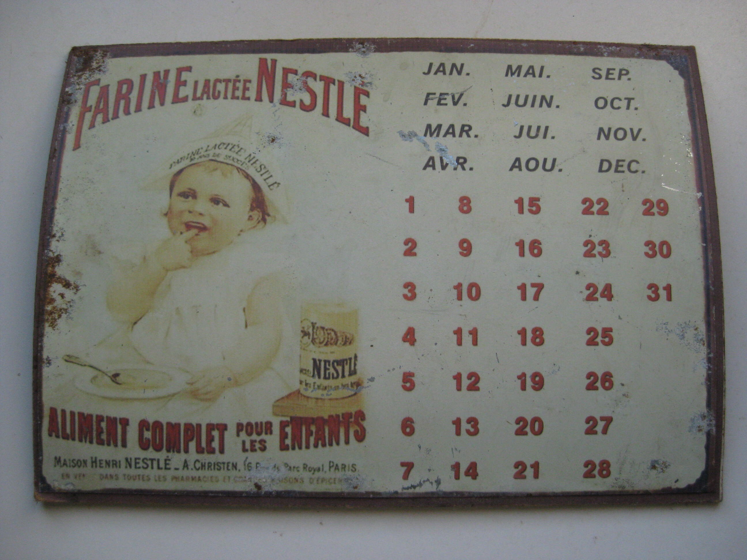 Français Métaux sur L'affiche Publicitaire Hardboard avec Calendrier de Nestlé.