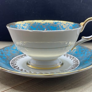 Ansley Turquoise en gouden bloemen theekop en schotel, Engeland