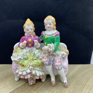 Figura de pareja de encaje victoriano