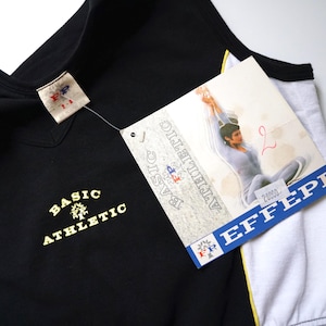 May include: Black sleeveless athletic top with white and yellow trim. The top has the text "BASIC ATHLETIC" embroidered in yellow on the front. The tag attached to the top reads "BASIC ATHLETIC" and "EFFEPI" with a woman doing a yoga pose on the tag.