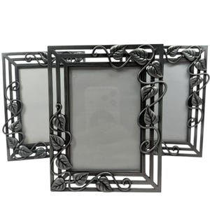 May include: Three rectangular picture frames made of dark gray metal. Each frame features a decorative border with a raised vine and leaf pattern that wraps around the edges. The frames have a smooth, matte finish and a central rectangular opening.