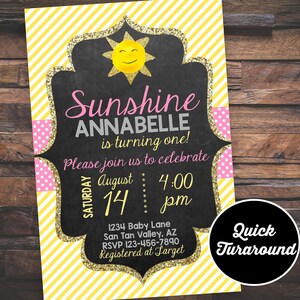 May include: A yellow and pink birthday invitation with a chalkboard background. The invitation says "Sunshine Annabelle is turning one!" and includes details for the party, including the date, time, and location. The invitation also includes a sun graphic with a smiling face.