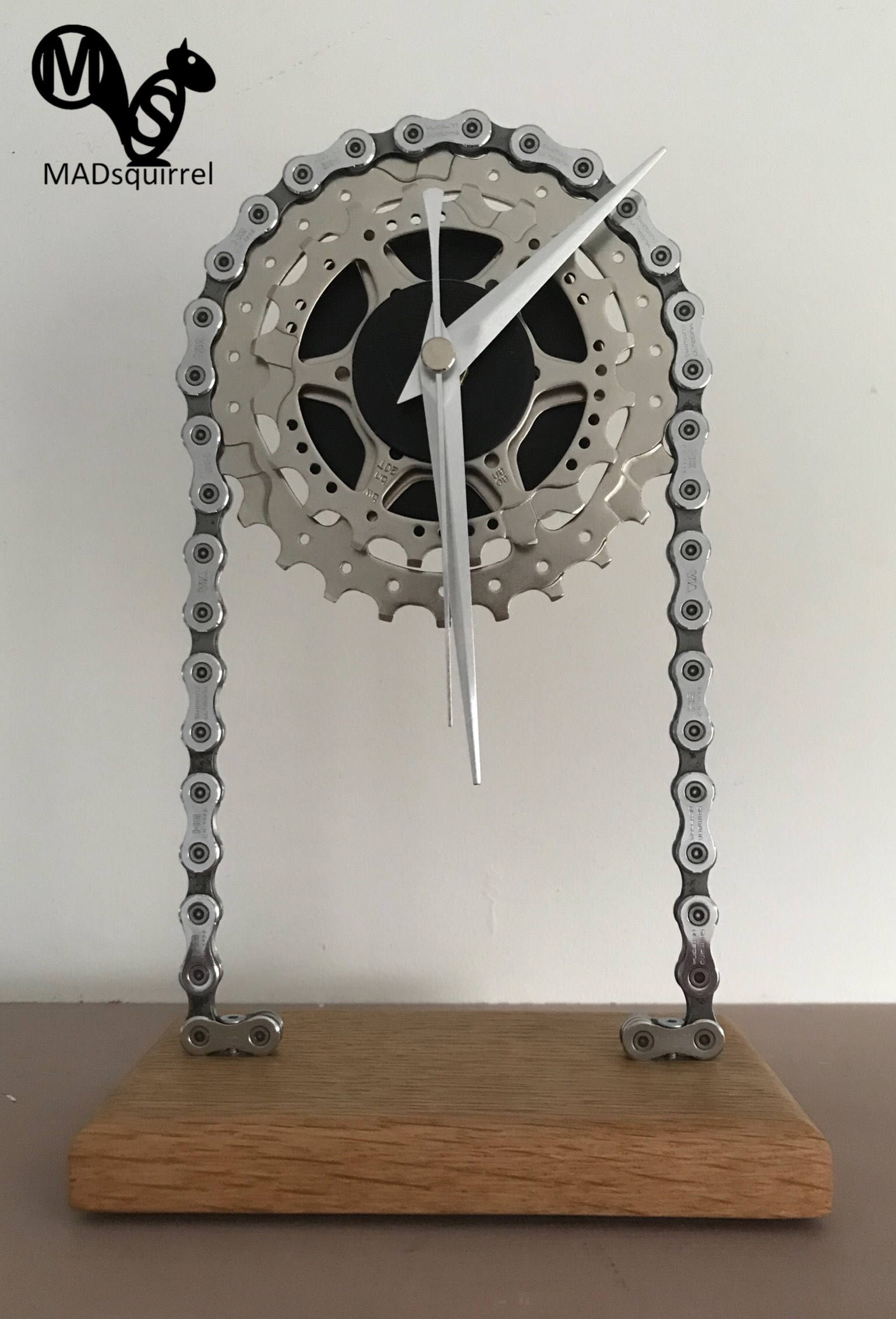 New Design Of Floating Sprocket Desk Shelf Clock With A Double New Design Of Floating Sprocket Desk Shelf Clock With A Double Open Face Silver Hands Polished Chain