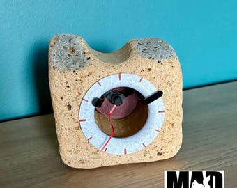 Tide Clock made from a cream coloured sea worn brick found on the Kent shore