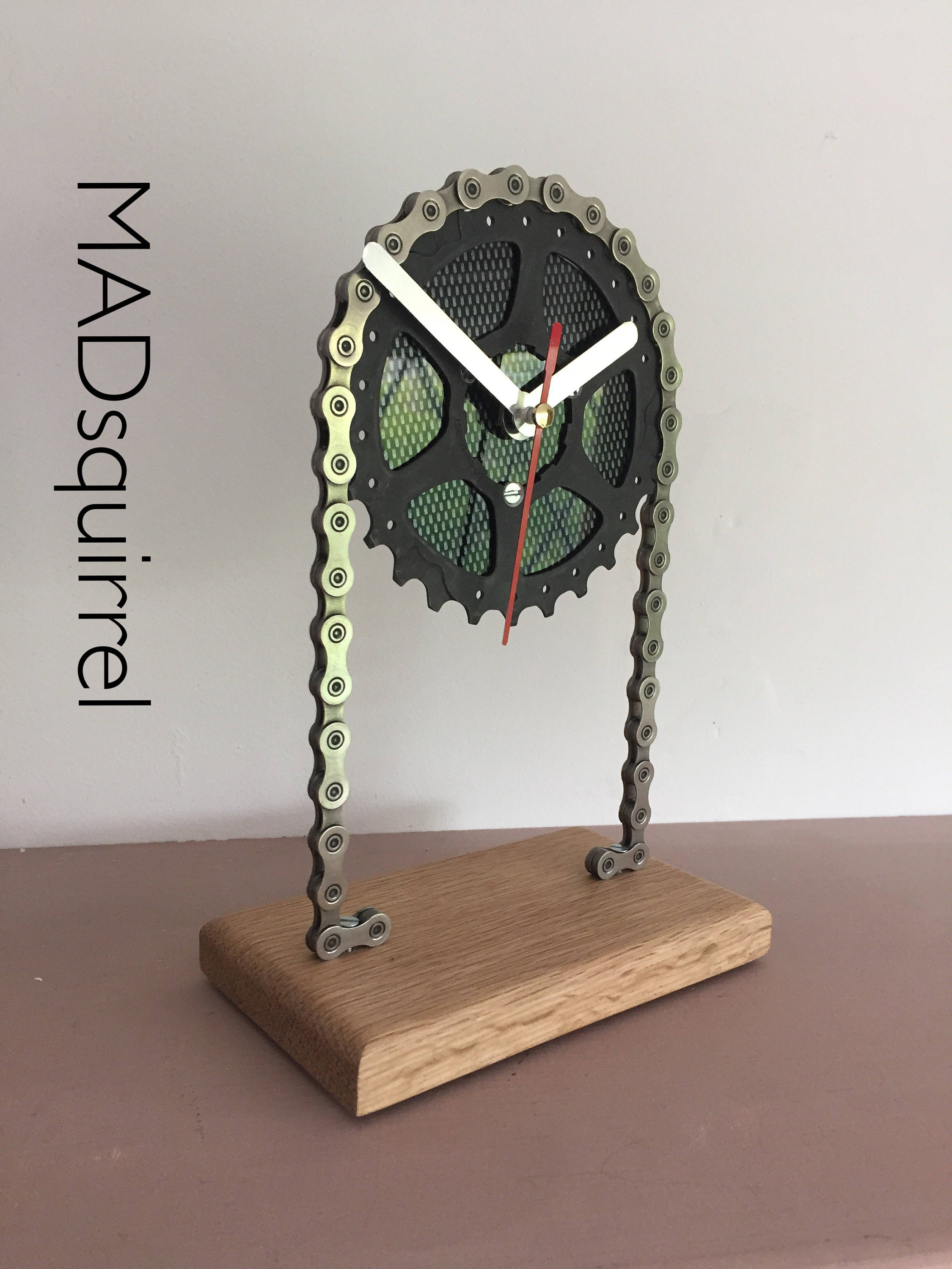 Floating Sprocket Desk/Shelf Clock with Black Carbon Fibre Effect Face