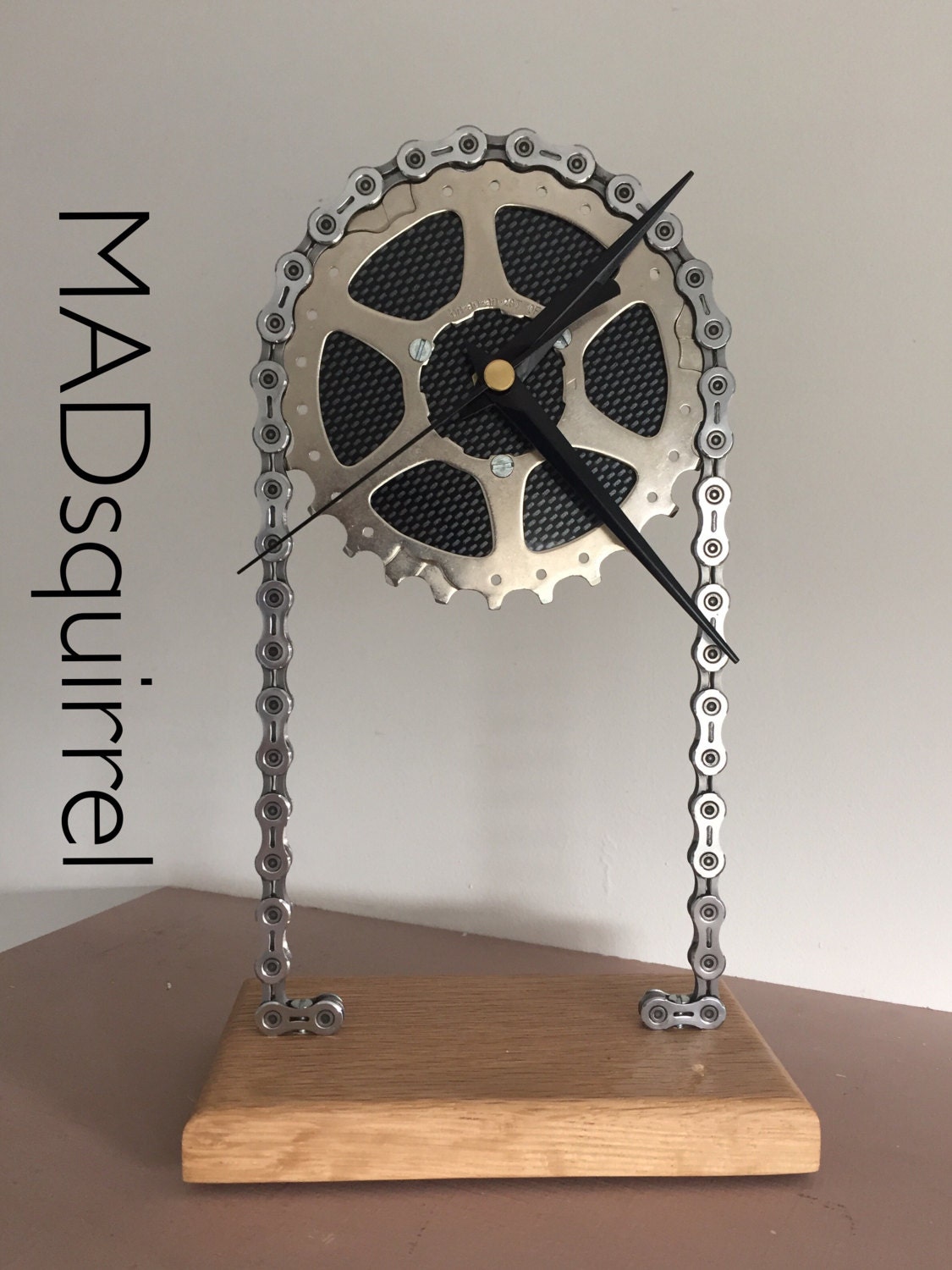 Floating Sprocket Desk/Shelf Clock with Black Carbon Fibre Effect Face