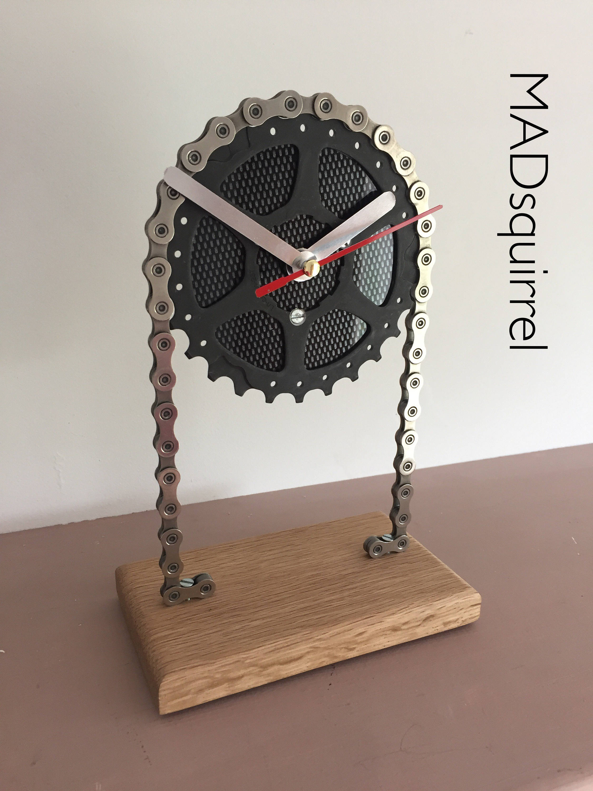 Floating Sprocket Desk/Shelf Clock with Black Carbon Fibre Effect Face