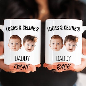 May include: White ceramic mug with a black inscription "Lucas & Celine's Daddy" and two photos of babies. The mug is labeled "Front" on the bottom. The back of the mug has the same inscription and photos, but is labeled "Back" on the bottom.