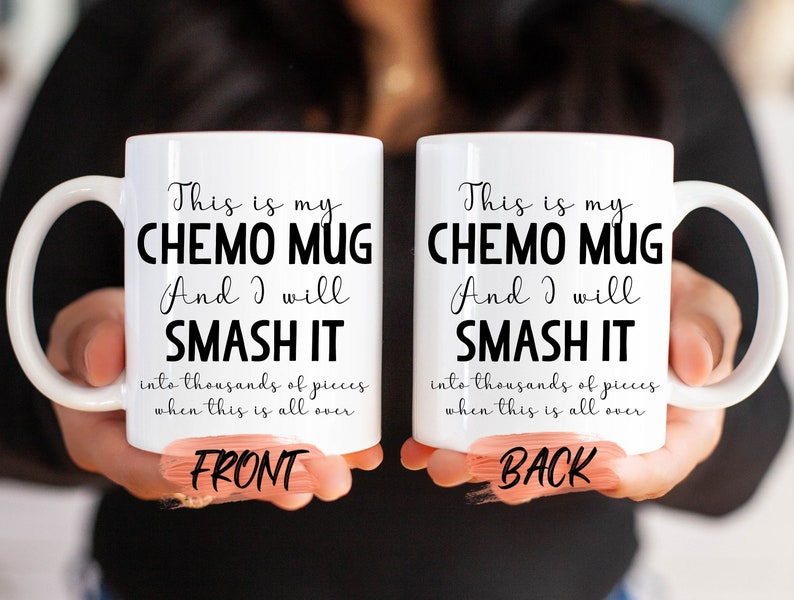 May include: White ceramic mug with black text that reads "This is my CHEMO MUG And I will SMASH IT into thousands of pieces when this is all over". The mug is shown from the front and back.
