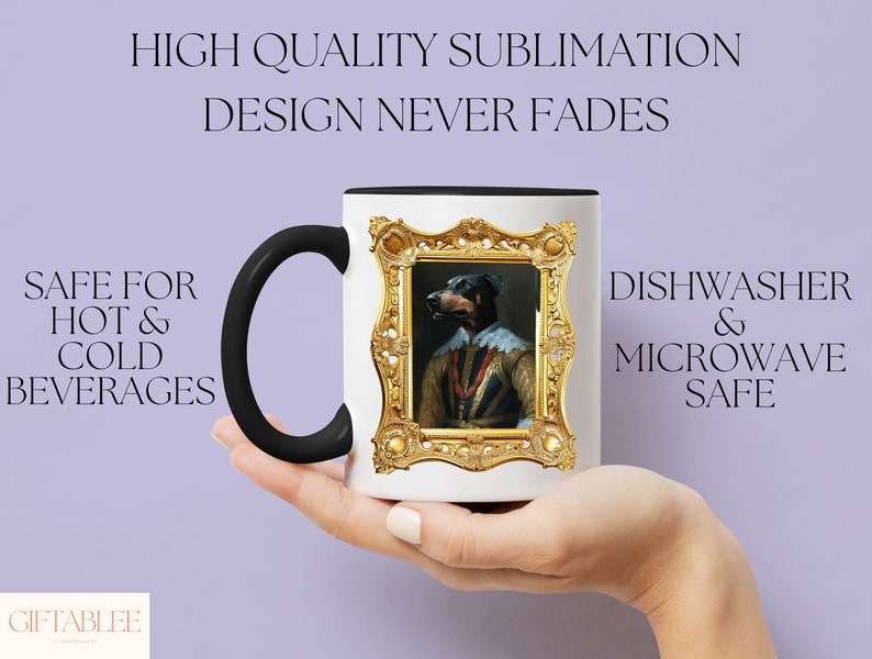 a person holding a coffee mug with a painting on it