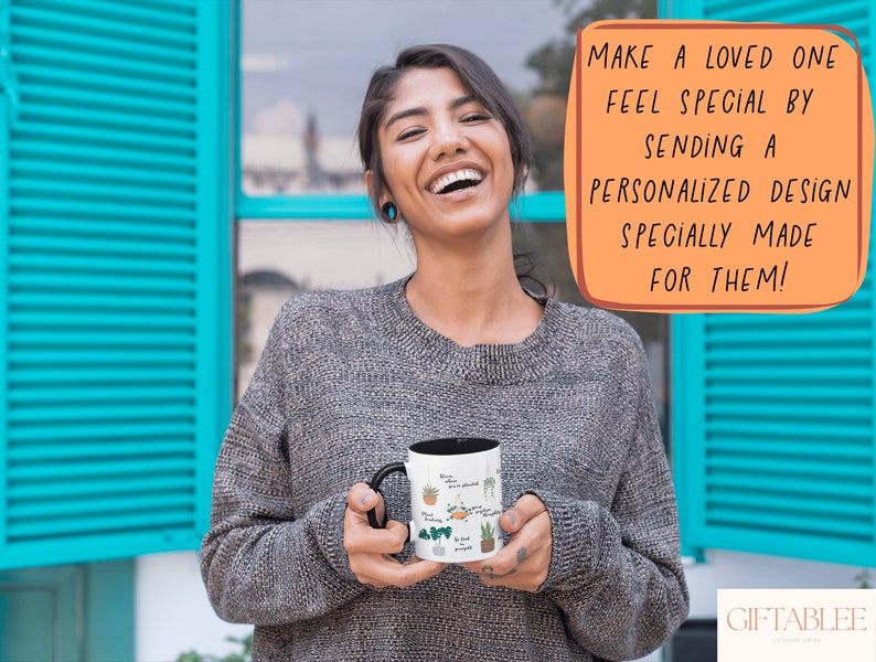 May include: A woman smiles while holding a white ceramic mug with a black handle. The mug has a design of various potted plants and the text "Plant Lady" on it. The text "MAKE A LOVED ONE FEEL SPECIAL BY SENDING A PERSONALIZED DESIGN SPECIALLY MADE FOR THEM!" is in a speech bubble above her head. The text "GIFTABLEE" is in the bottom right corner of the image.