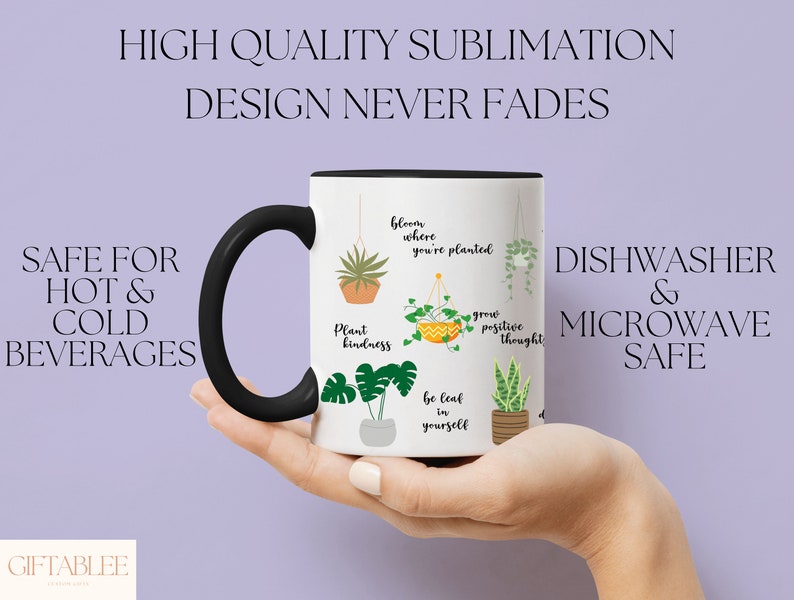 May include: White ceramic mug with a black handle. The mug has a design of potted plants with inspirational quotes. The quotes include "Plant kindness", "Bloom where you're planted", "Be leaf in yourself", and "Grow positive thought". The mug is dishwasher and microwave safe.