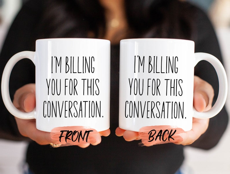 two coffee mugs that say i'm telling you for this conversation