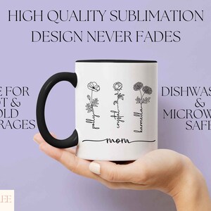 May include: White ceramic mug with a black handle and rim, featuring floral line art and the names "pally", "crystal", and "karmella". Text on the mug reads "mom", "Safe for Hot & Cold Beverages", and "Dishwasher & Microwave Safe".