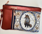 Wristlet purse with vertical front zip pocket, metallic rust faux leather, stained glass fox