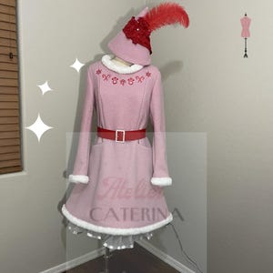 jovie elf pink dress Women's Warner Bros Discovery Costume The skirt swishes beautifully when youre spinning around and around in a revolving door or skating at Rockefeller Center Jovi Pink Elf Dress -