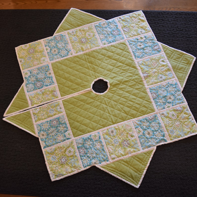 Modern Christmas tree skirt in blues and greens