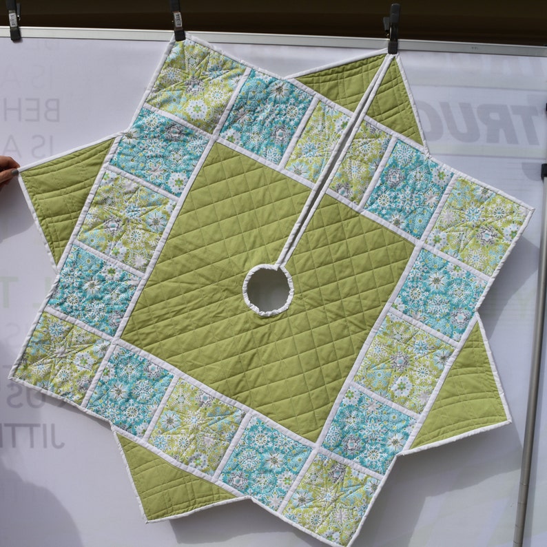 Modern Christmas tree skirt in blues and greens