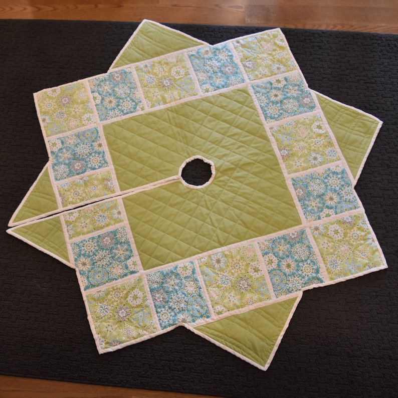 Modern Christmas tree skirt in blues and greens