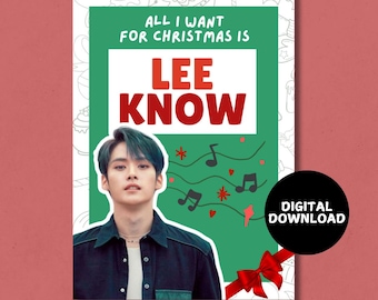May include: A digital download printable featuring a photo of a man with the text "All I want for Christmas is Lee Know" in red and white text on a green background with musical notes and hearts.