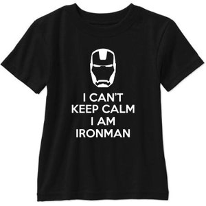 May include: Black t-shirt with a white graphic of Iron Man's face and the text "I can't keep calm I am Iron Man".